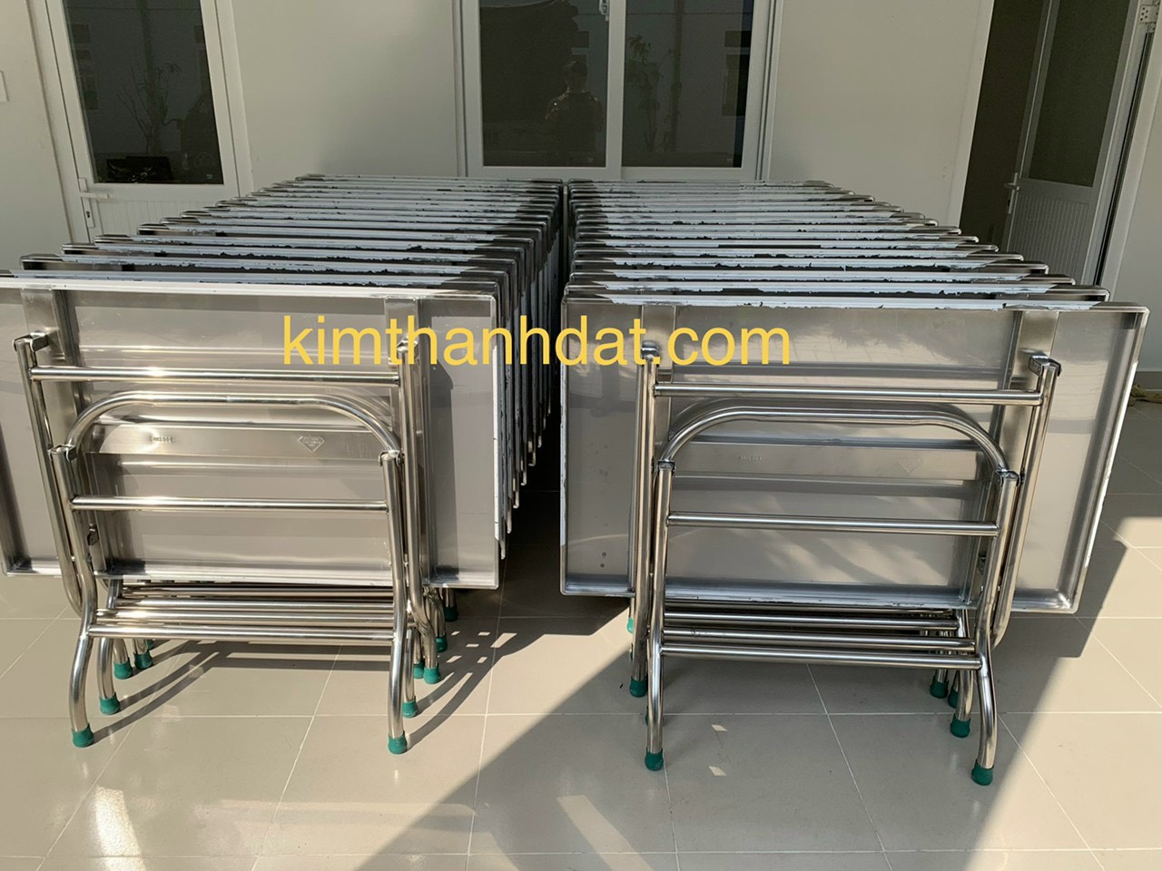 Bàn ăn inox chân xếp